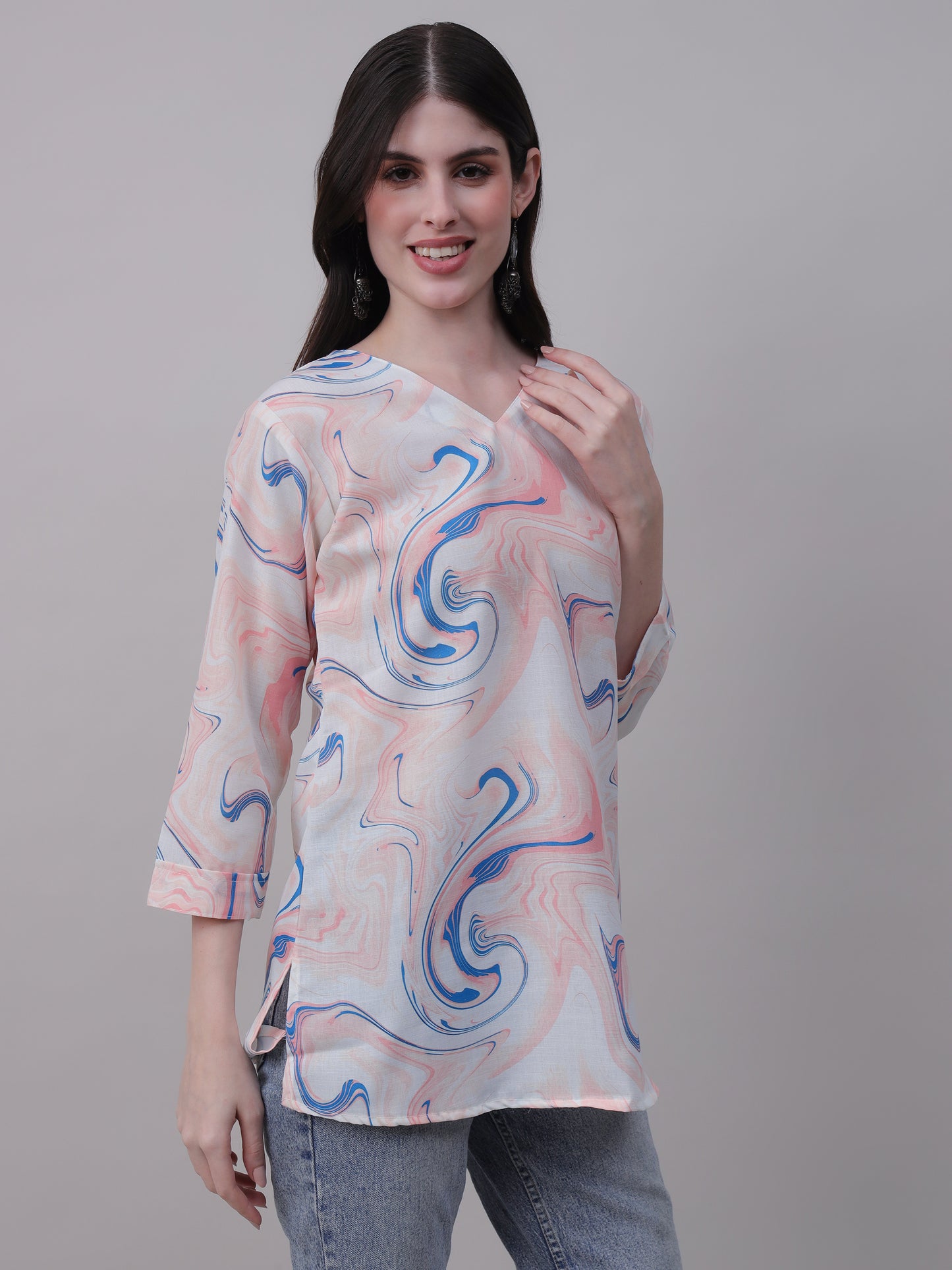 Aqua print tunic with pastel tones