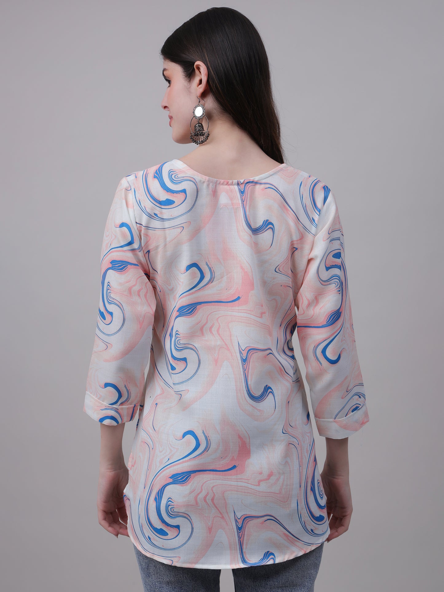 Aqua print tunic with pastel tones